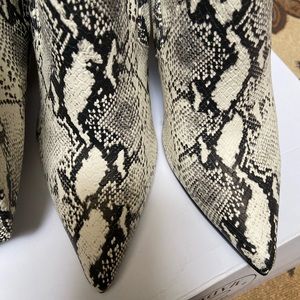 Snake print over-the-knee boots